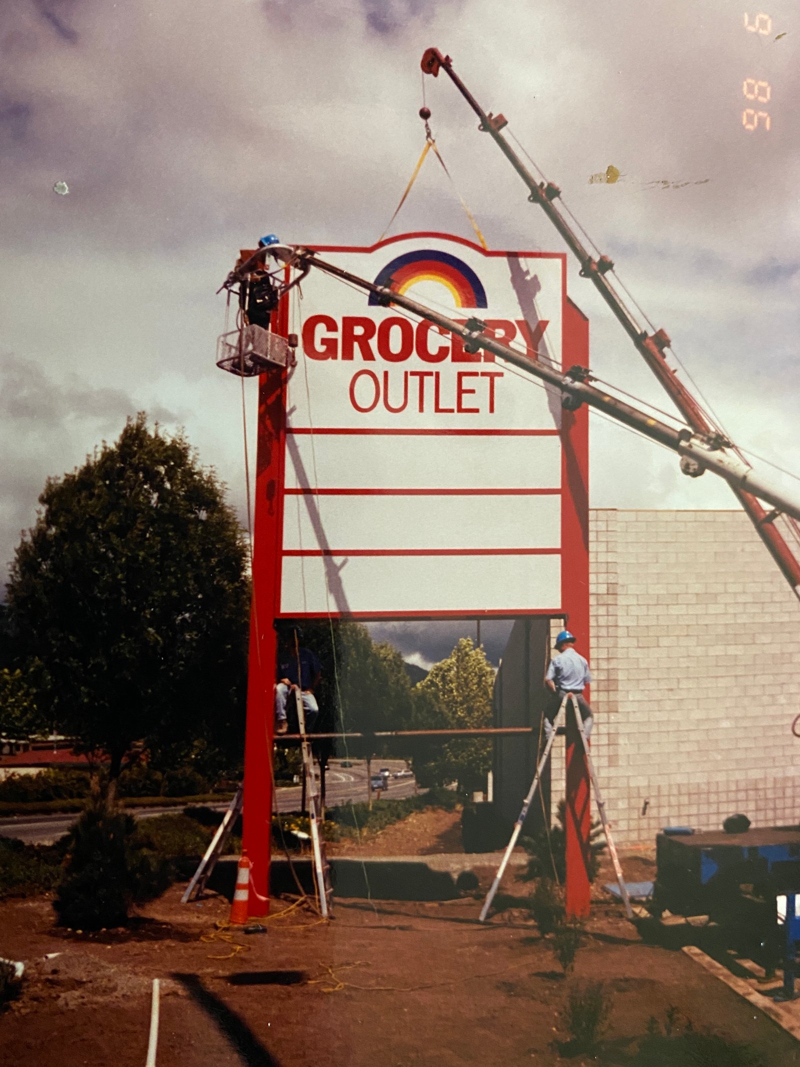 Grocery Outlet pylon sign installation with crane